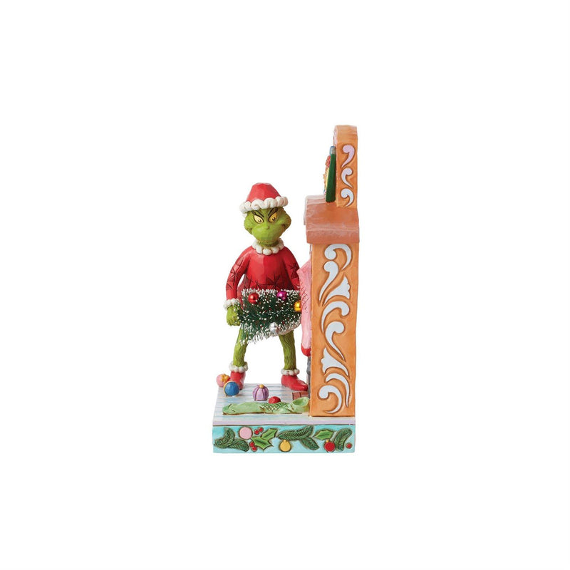 Grinch Pushing Tree Up Figurine