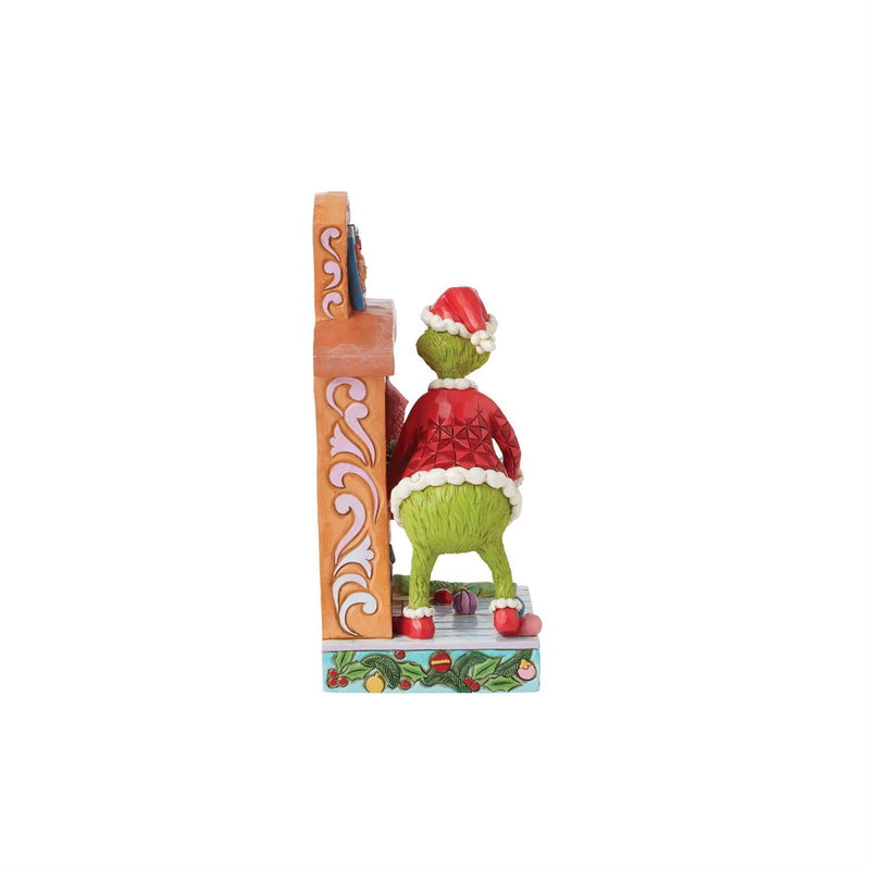 Grinch Pushing Tree Up Figurine