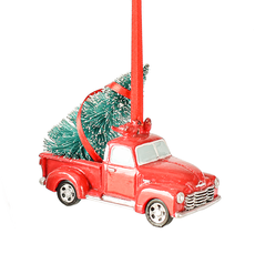 Red Pickup Truck brings home the tree